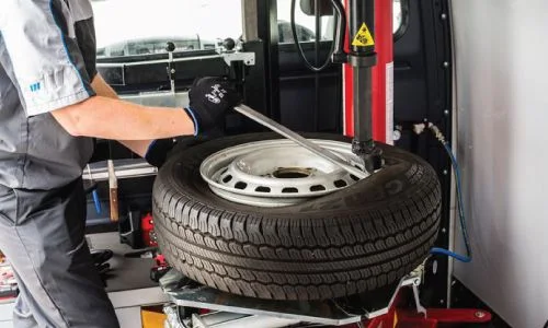 Onsite tyre installation service at a Dubai location
