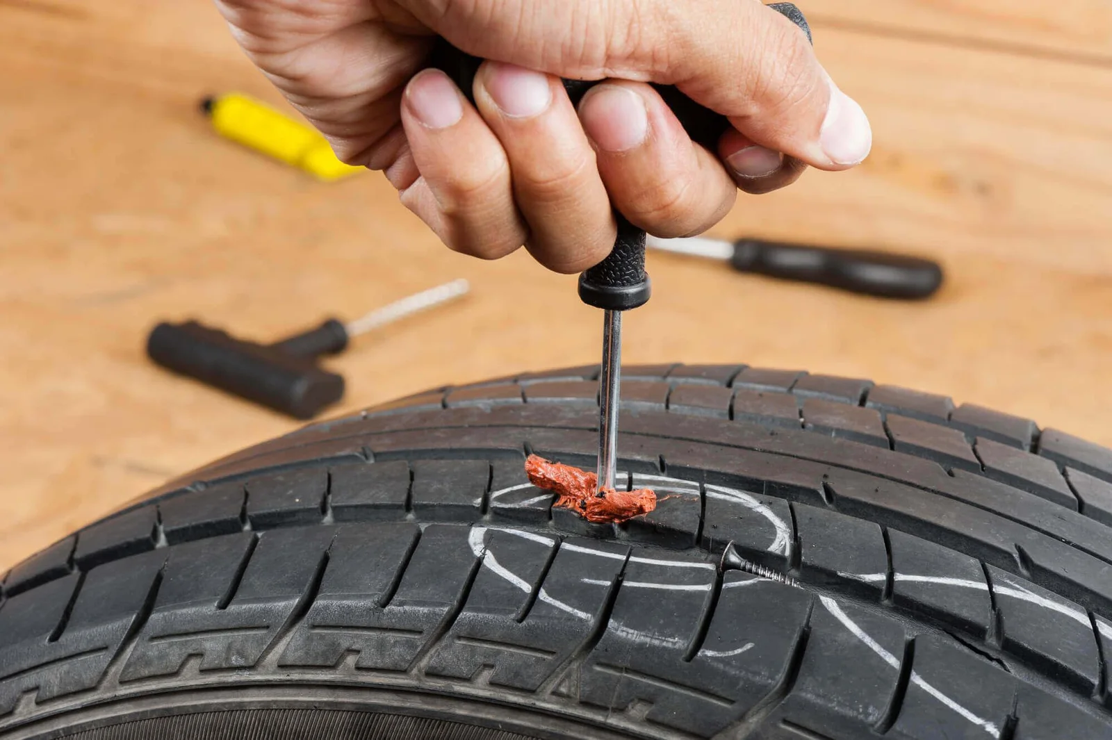 Tyre puncture inspection by a mobile technician in Dubai